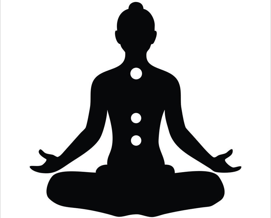 black silhouette image of a woman sitting cross legged with arms slightly outstretched (yoga style), with white circles appearing on her body representing parts of her body she may be focusing on for relaxation