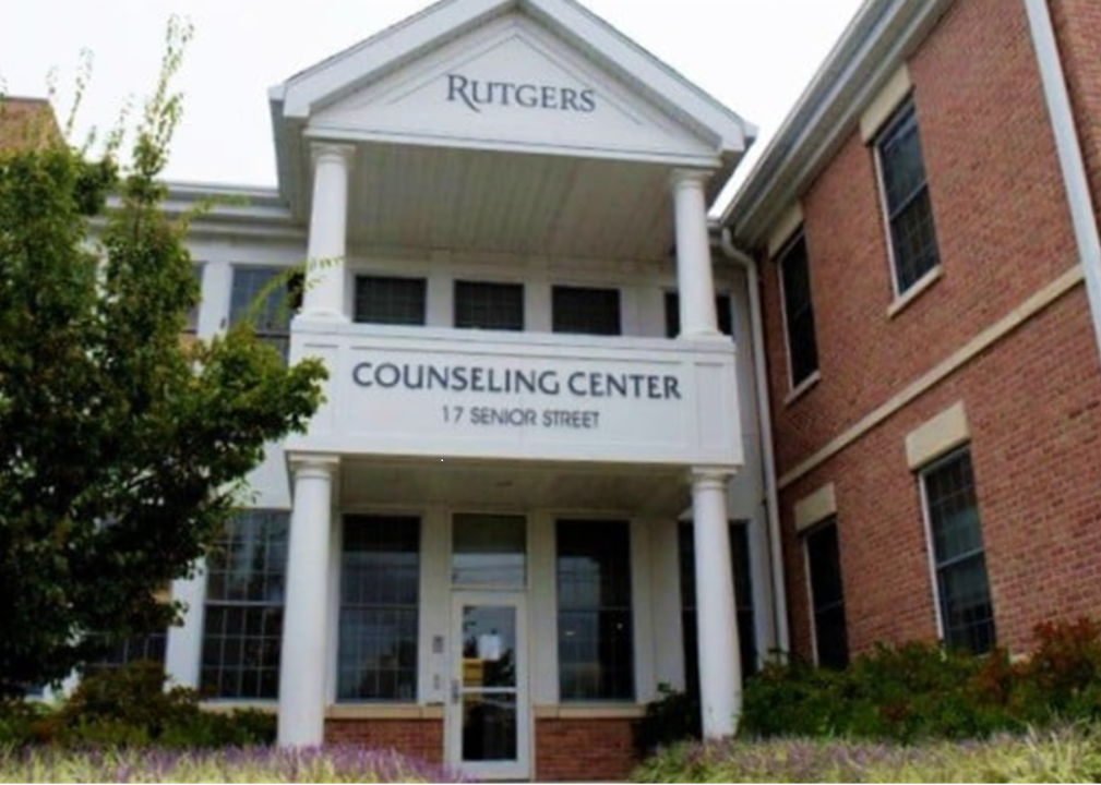 Photo of the front the CAPS counseling center located at 17 Senior Street in New Brunswick. Brick building with white pillars and framing