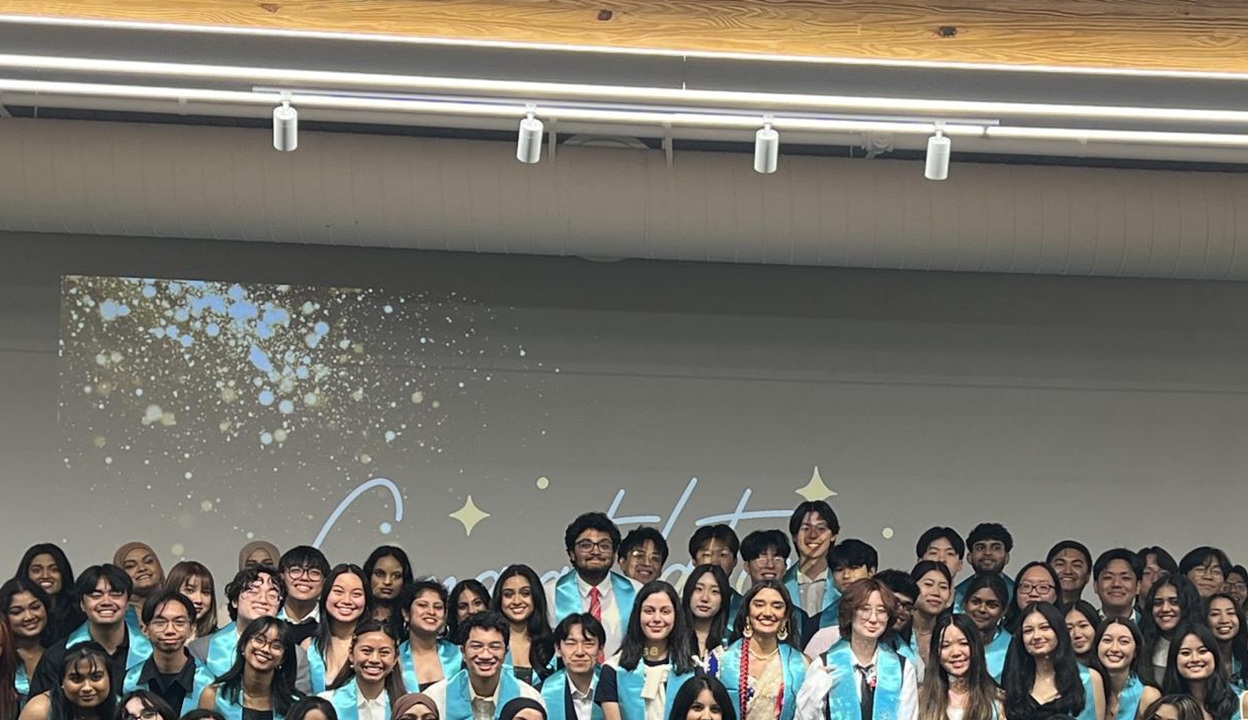 Photo of large group of students at an event sponsored by the Asian American Cultural Center